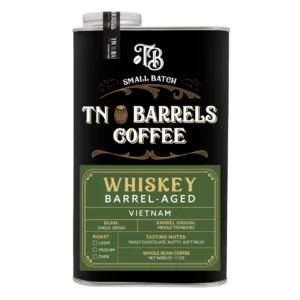 TN Barrels Coffee small batch whiskey barrel-aged Vietnam whole bean coffee can with black and green label on a white background.