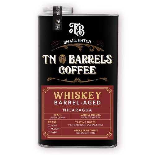 TN Barrels Coffee whiskey barrel-aged Nicaragua whole bean coffee can with black and gold label on a transparent background.